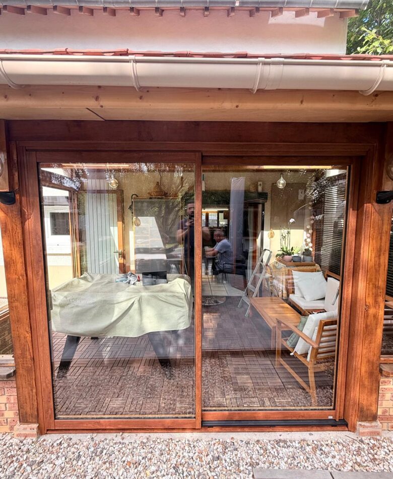 BAIE COULISSANTE MIXTE BOIS ALUMINIUM PLAXE CHENE DORE EXT